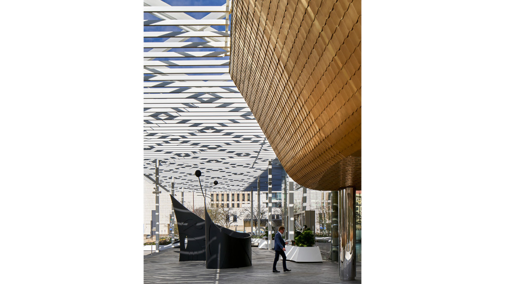 A person walking in a large building.